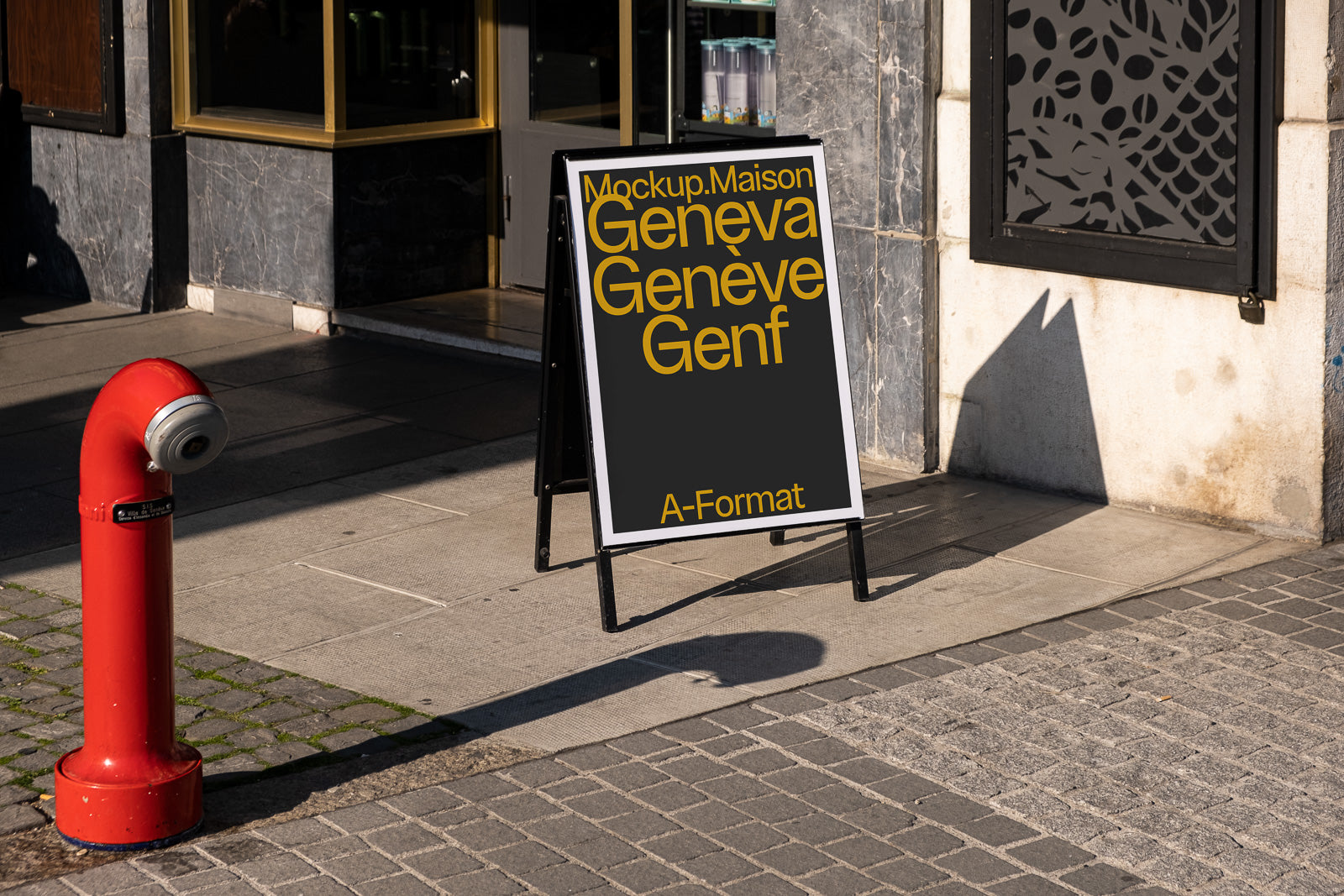 PSD mockup of an outdoor freestanding sign on a city sidewalk next to a red hydrant, with sunlit building facade in the background.