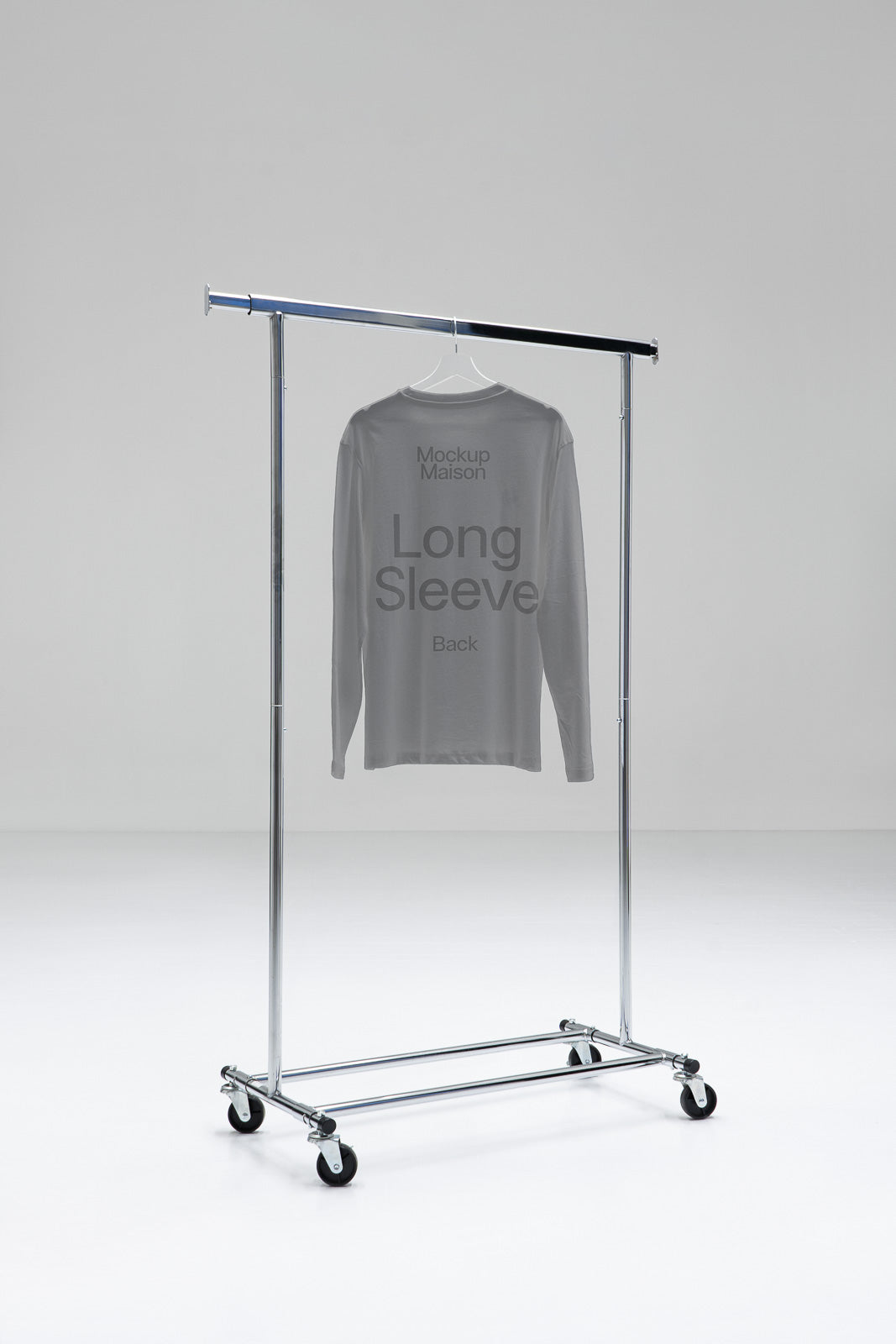 PSD mockup of a long-sleeve shirt hanging on a chrome clothing rack in a minimalistic white studio setting.