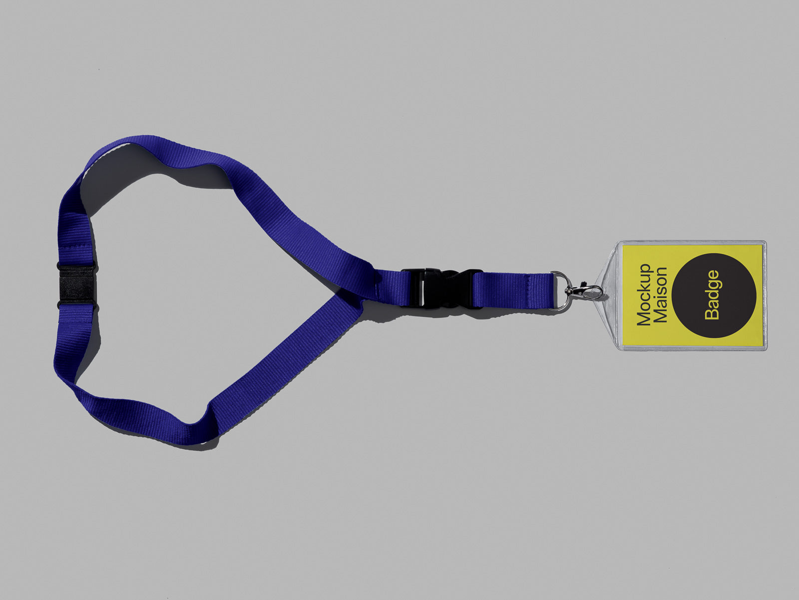 PSD mockup of a blue lanyard with a black clip, attached to a transparent badge holder displaying a yellow card labeled "Mockup Maison Badge."