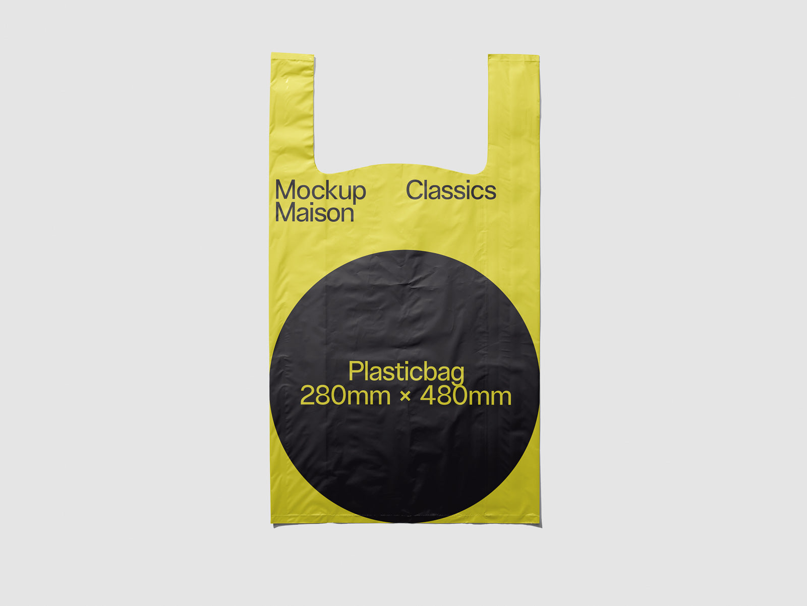 PSD mockup of a yellow and black plastic bag design with text "Mockup Maison Classics" and "Plasticbag 280mm x 480mm" displayed prominently.