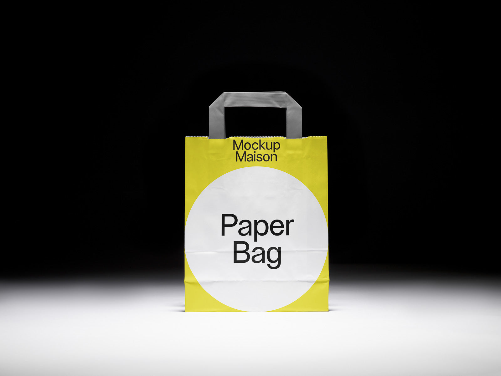 PSD mockup of a yellow and white paper bag with a rectangular handle, displaying "Mockup Maison" and "Paper Bag" in black text on the front.
