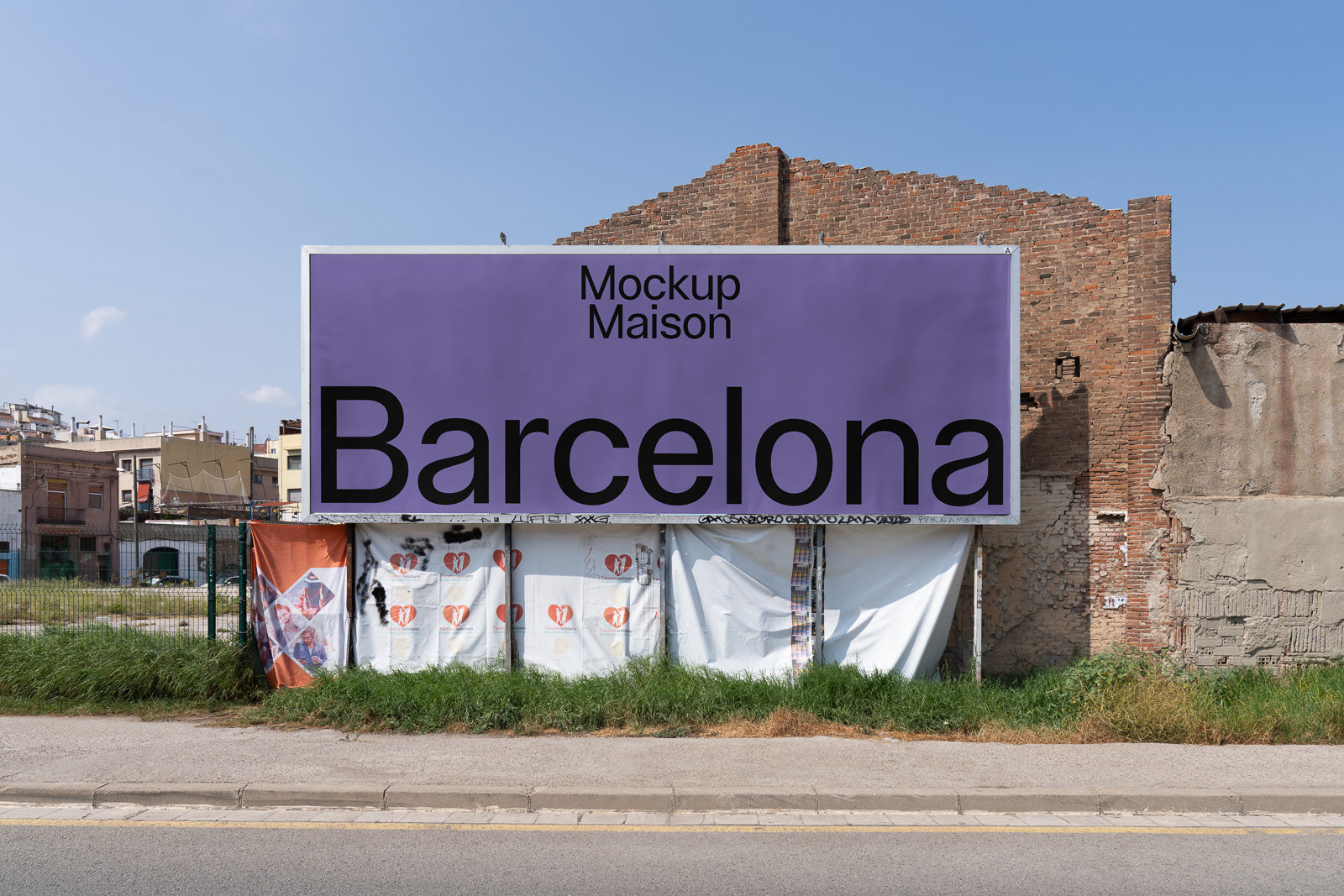 PSD mockup of a large outdoor billboard with a purple background displaying the word "Barcelona" and "Mockup Maison," set against an urban backdrop with buildings and grass.