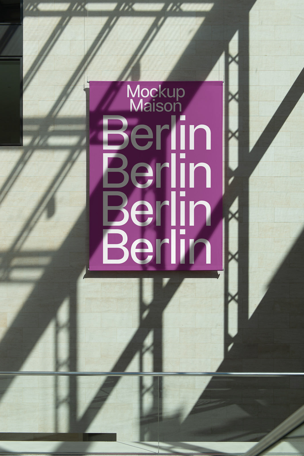 PSD mockup of a large purple banner on a building wall with "Mockup Maison" and "Berlin" repeated. Shadows of beams create a pattern on the surface.