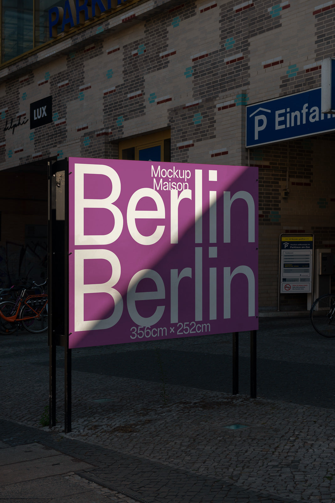PSD mockup of a large outdoor sign with "Berlin" text, set against an urban backdrop, highlighting dimensions 356cm by 252cm.