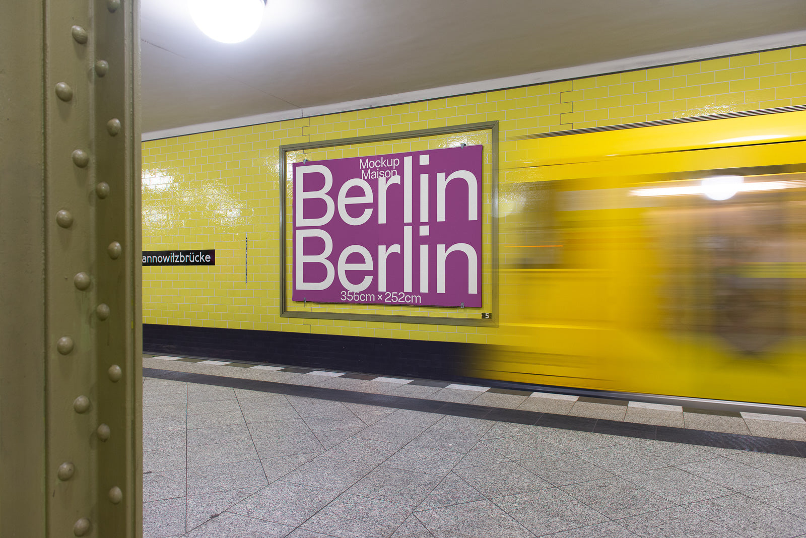 PSD mockup of a subway station with a yellow tiled wall and a large poster displaying "Berlin" twice in white text, next to a passing yellow train.