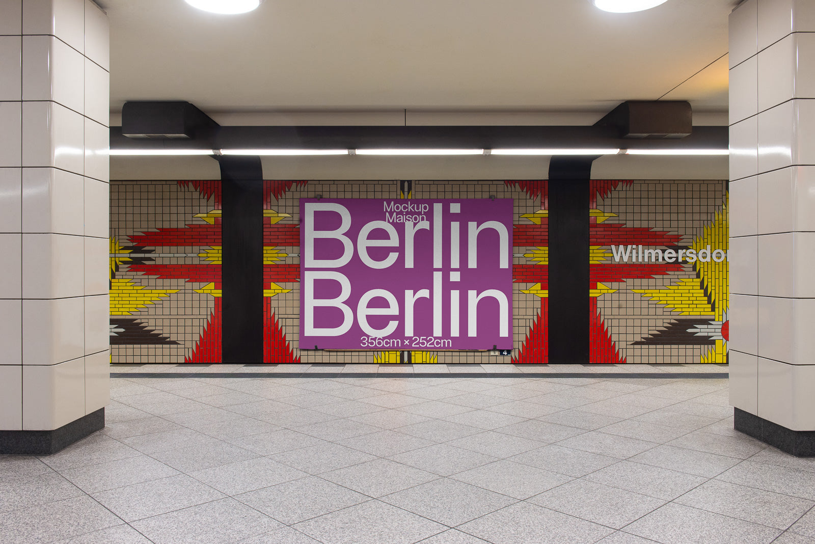 PSD mockup of a subway station platform wall featuring a large purple "Berlin" poster with geometric patterns in red, yellow, and black tiles surrounding it.