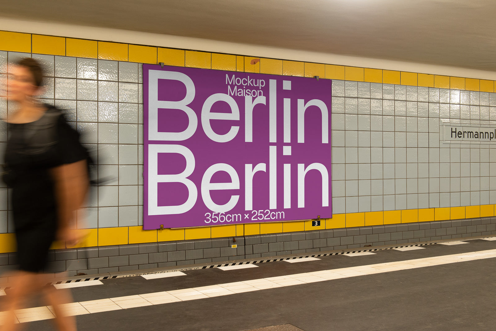 PSD mockup of a large purple Berlin poster on a subway wall with blurred pedestrian walking past, showcasing design dimensions of 356cm x 252cm.