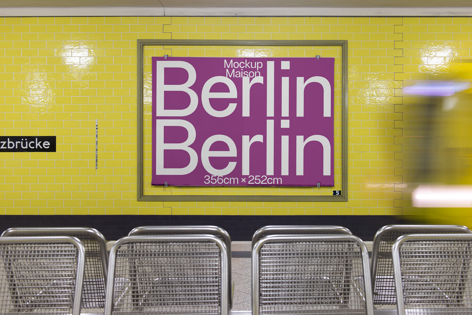 PSD mockup of a purple poster with "Berlin" in bold white letters, displayed on a yellow tiled wall, with a blurred train passing by.