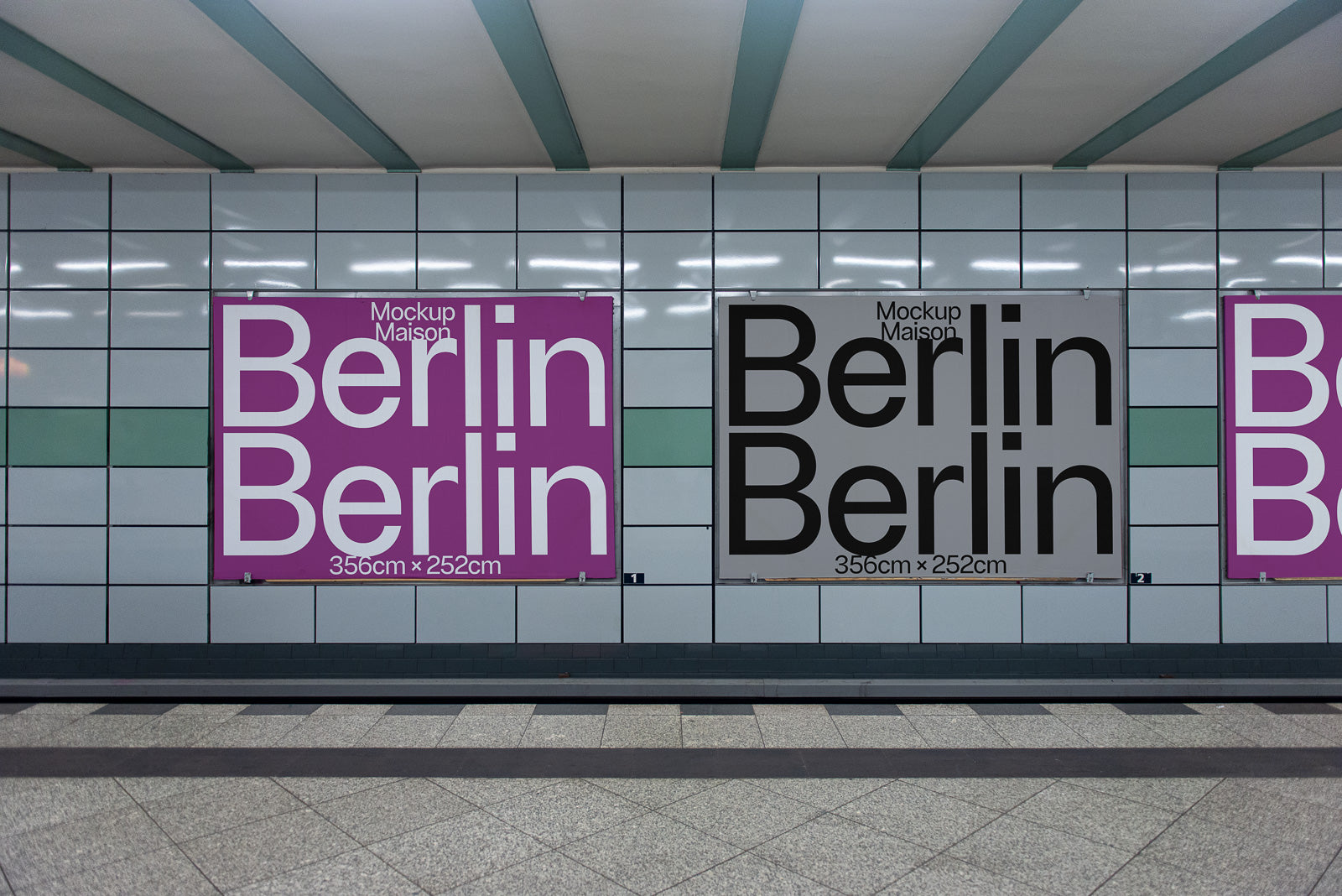 PSD mockup of two large posters side by side in a subway station, with one in pink and white text and the other in gray and black text.