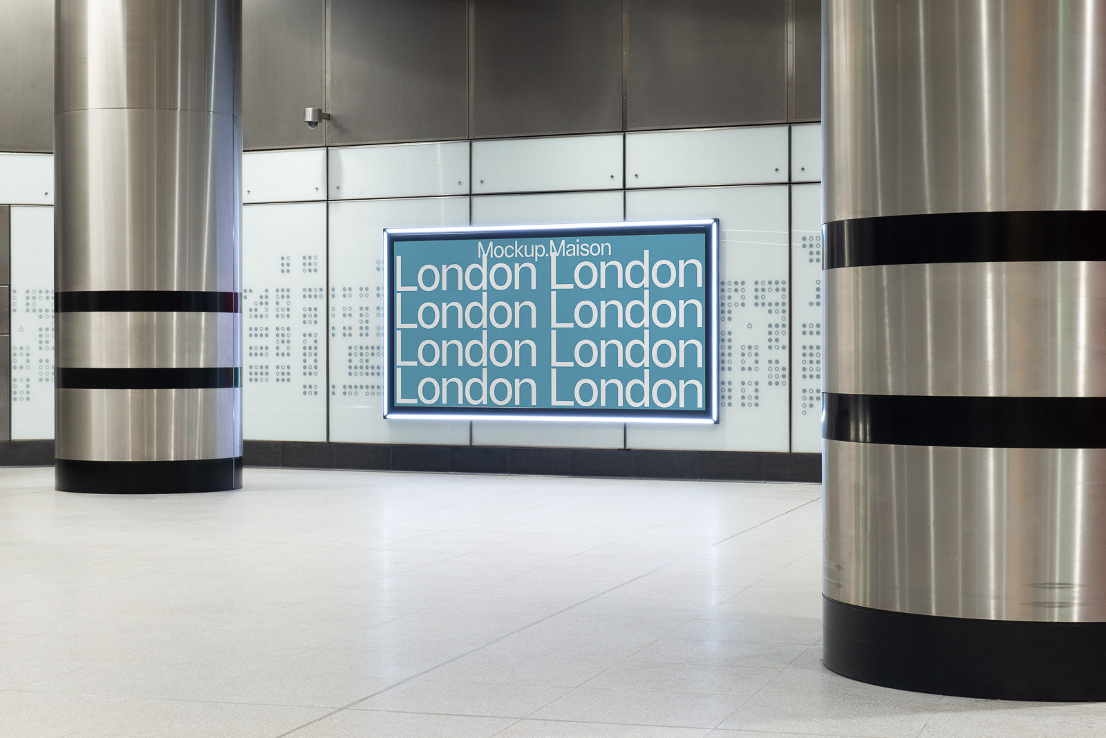 PSD mockup of a subway station interior featuring an illuminated billboard with a repetitive "London" text design, surrounded by metallic pillars and patterned walls.