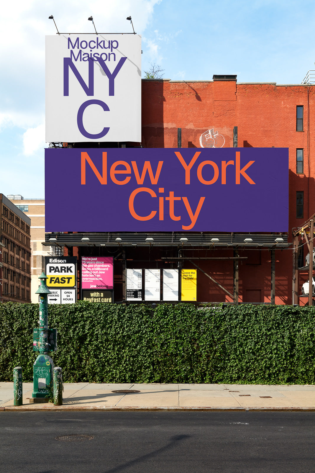 PSD mockup of a large billboard on a red brick wall displaying "New York City" in bold orange letters against a purple background, with ivy-covered wall below.