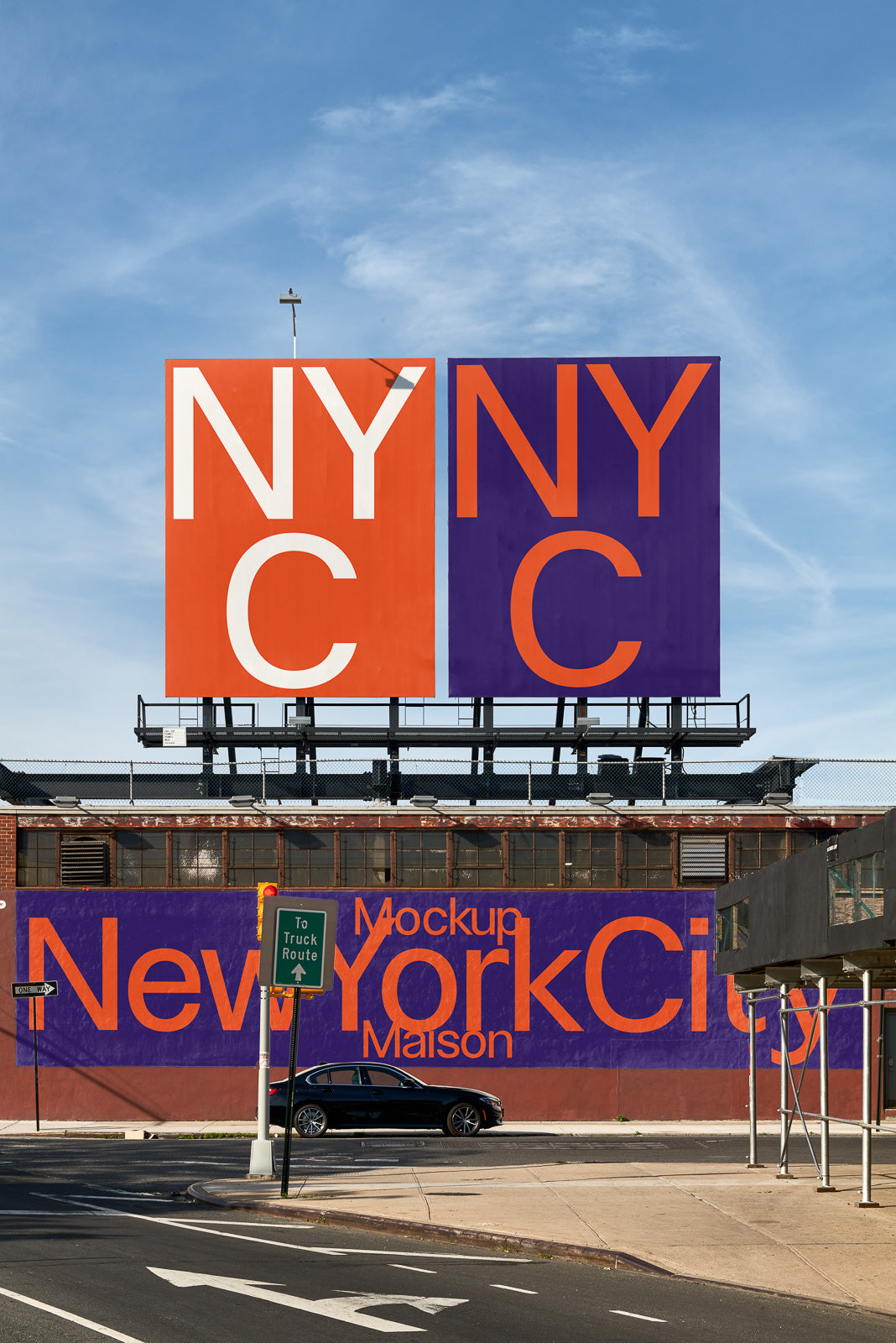 PSD mockup of large urban billboards featuring bold NY and New York City text in orange and purple, set against a clear blue sky backdrop.