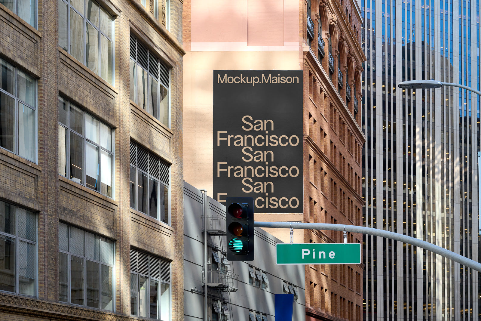 PSD mockup of a large urban building facade displaying "San Francisco" text repeatedly. The setting includes a nearby traffic light and street sign labeled "Pine."