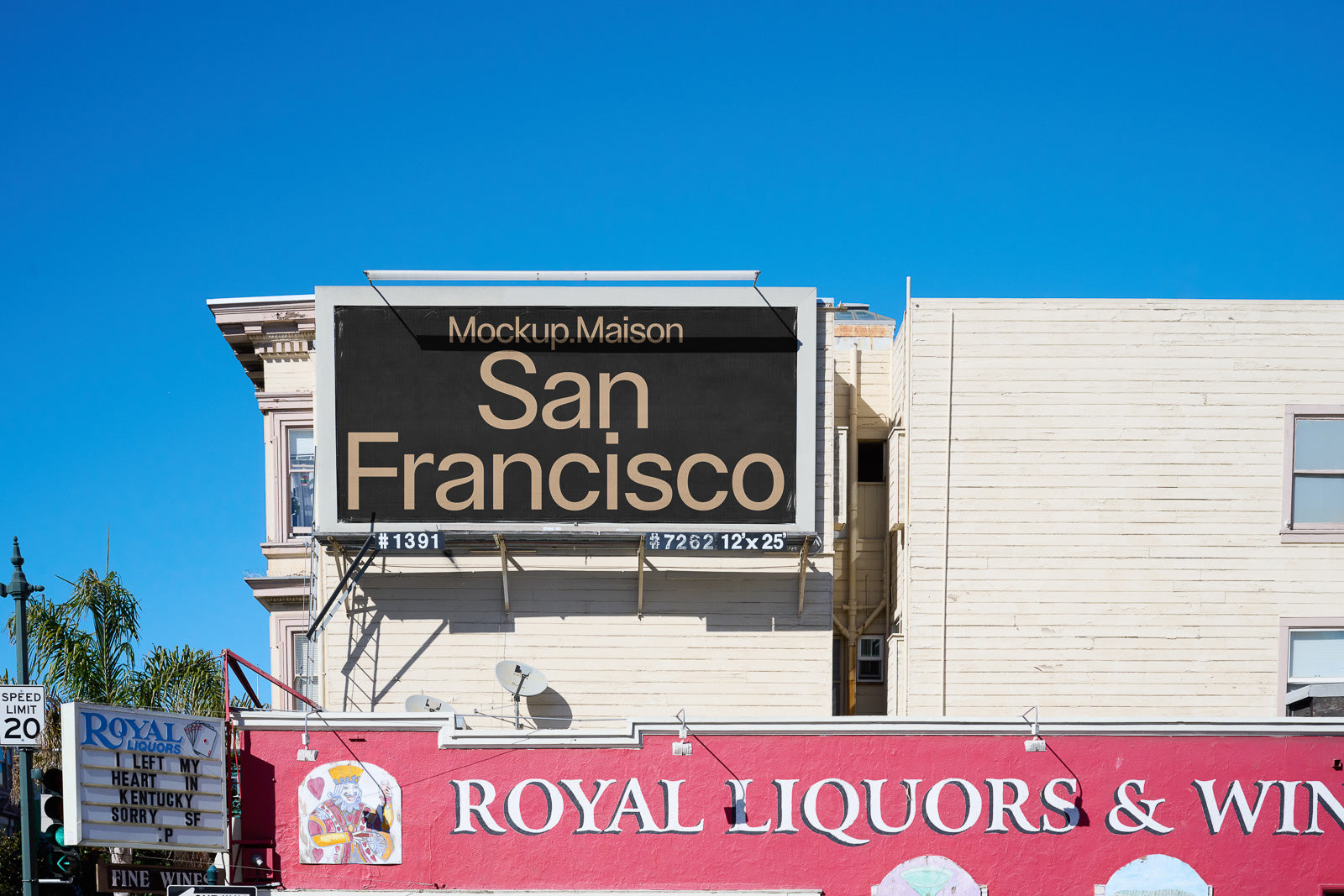 PSD mockup of a large billboard displaying "San Francisco" above a storefront with "Royal Liquors & Wine" signage against a clear blue sky.