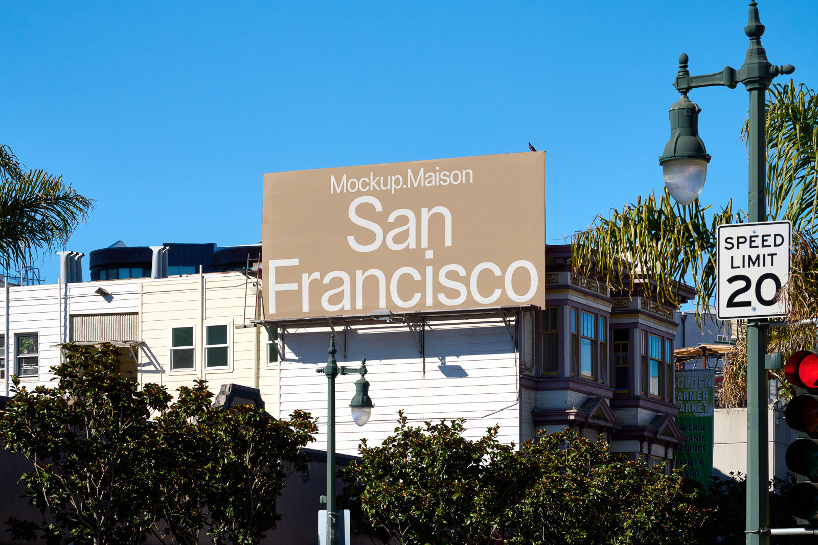 PSD mockup of a large outdoor billboard displaying the text "Mockup.Maison San Francisco" with buildings and trees in the background.