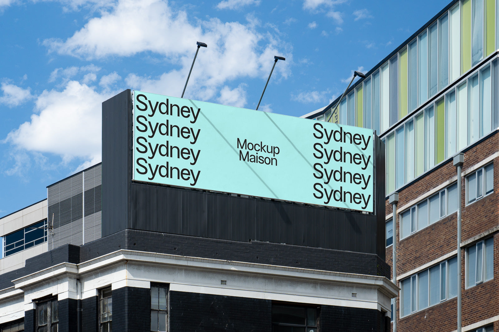 PSD mockup of a large outdoor billboard on a building, displaying the word "Sydney" repeatedly in bold letters against a light blue background.
