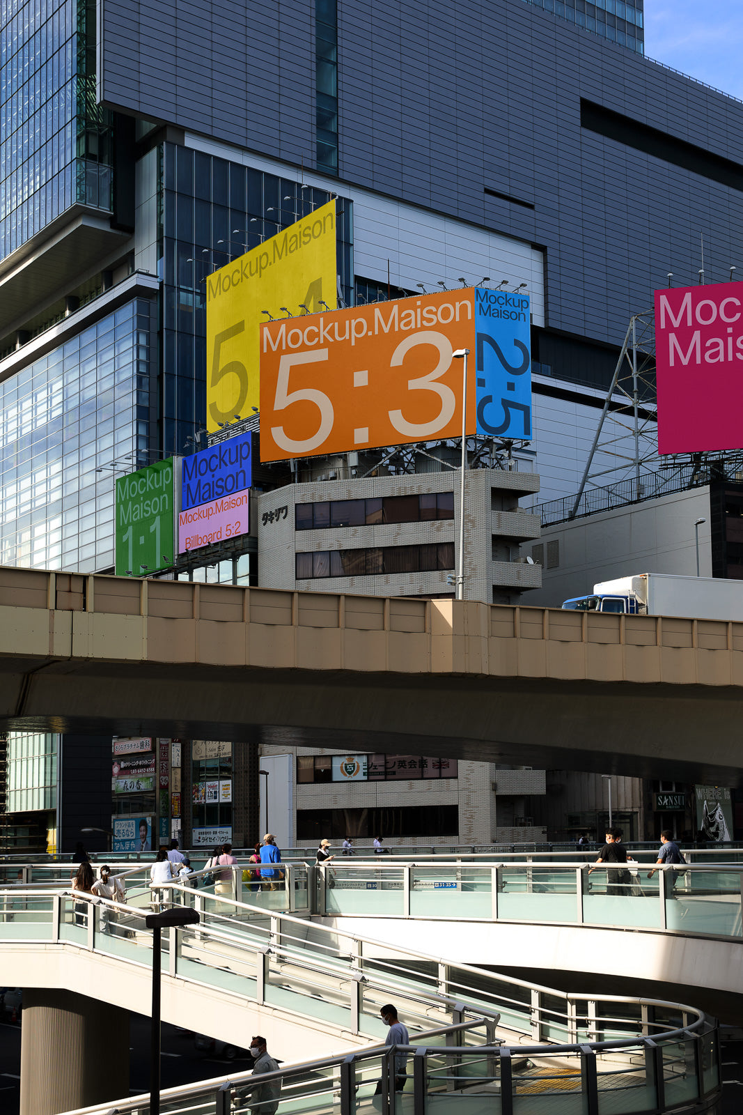 PSD mockup of urban billboards with bold "Mockup Maison" text and large numbers, set against a modern cityscape with pedestrians on a walkway.