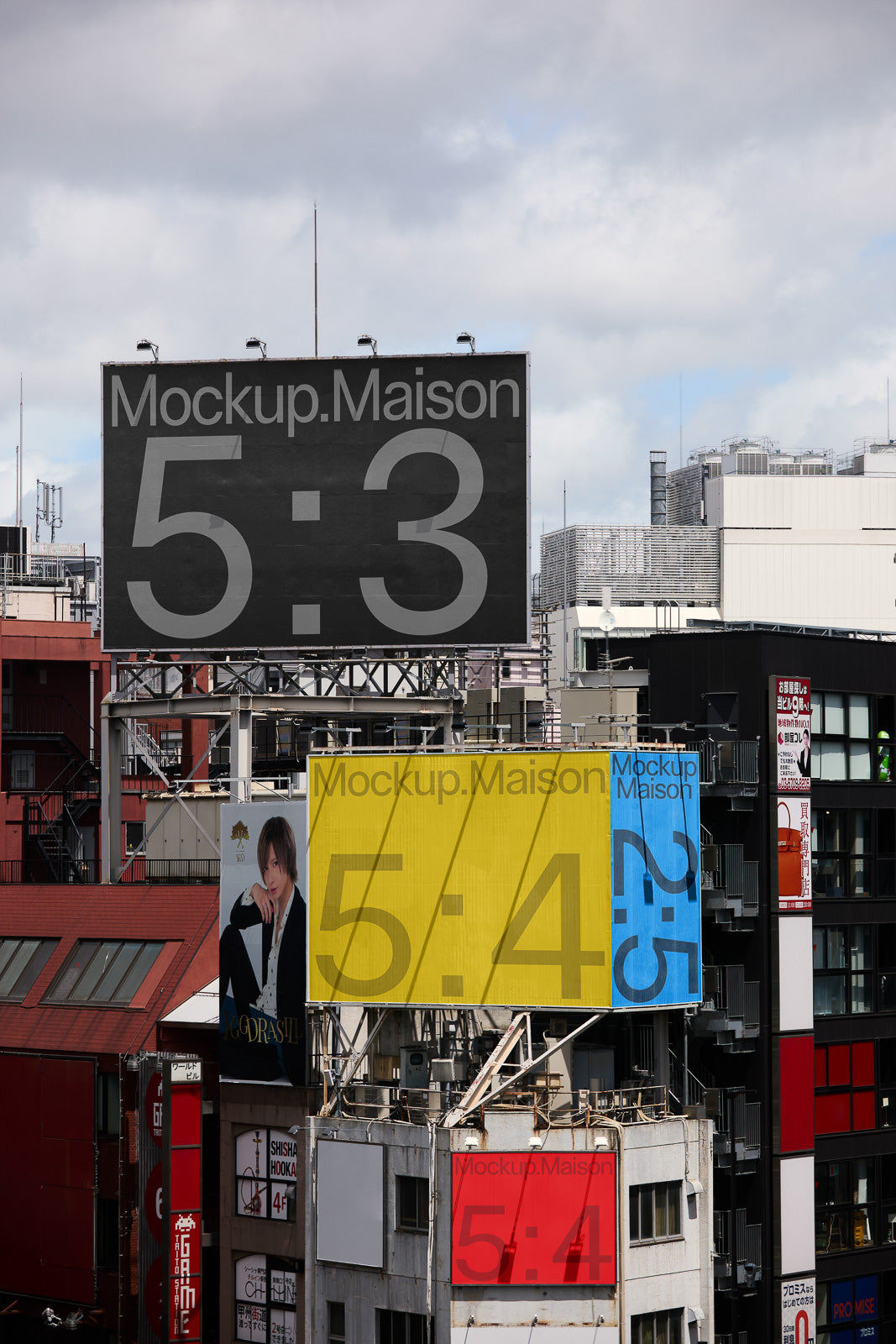 PSD mockup of urban billboards on building rooftops under a cloudy sky, featuring different color backgrounds and aspect ratios for design display.