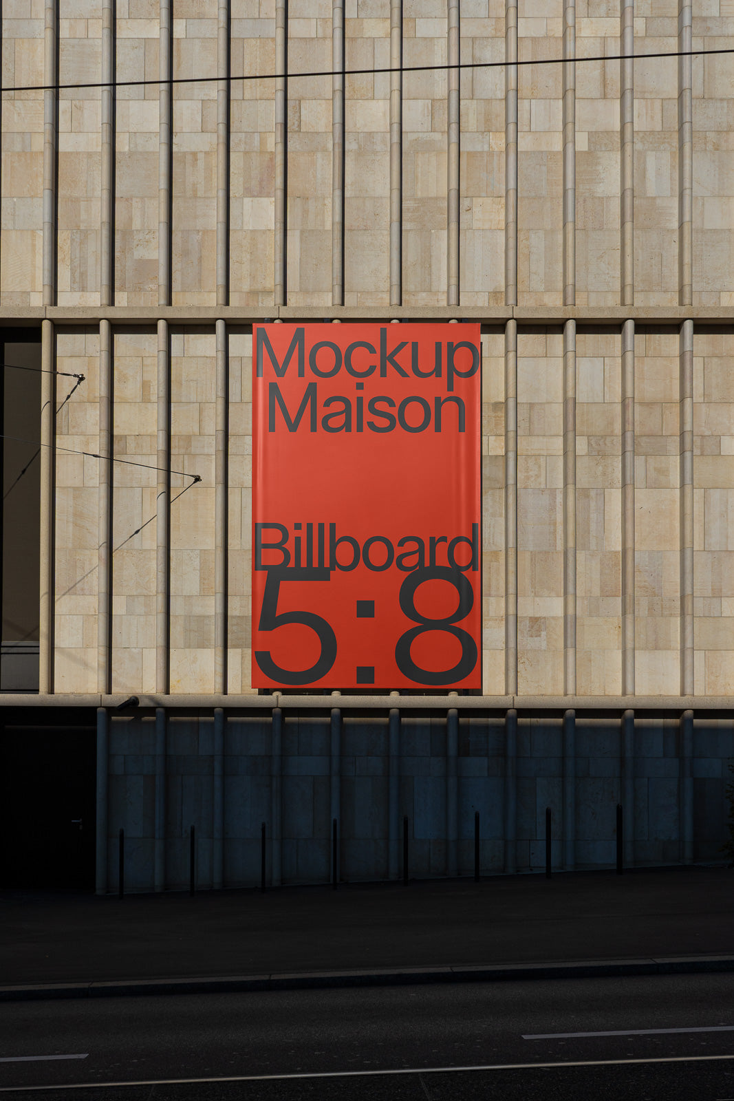 PSD mockup of a large vertical red billboard with bold black text against a beige tiled building facade.