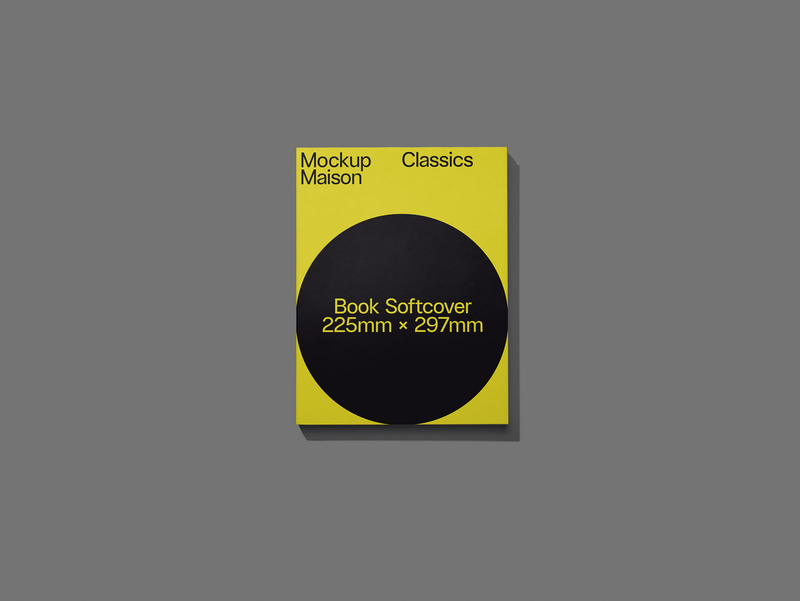 PSD mockup of a minimalist yellow softcover book with "Mockup Maison Classics" text, featuring a large black circle detailing dimensions 225mm x 297mm.