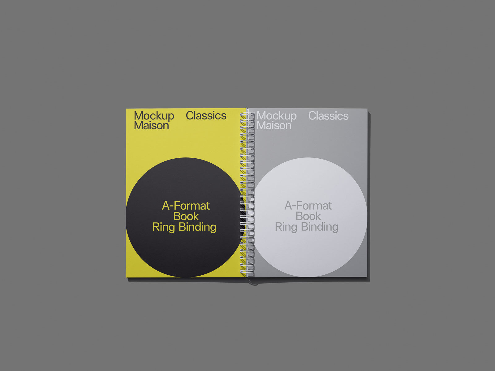 PSD mockup of an open spiral-bound book with yellow and gray covers, each displaying text "A-Format Book Ring Binding" inside large circles.