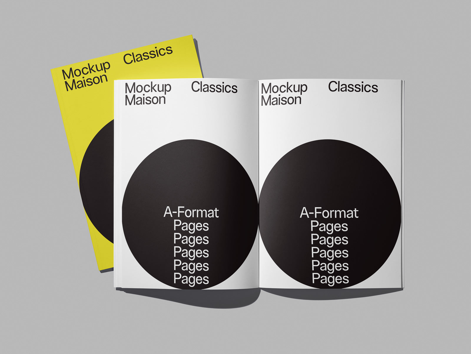PSD mockup of two open magazines with "Mockup Maison Classics" text and black circles on the covers, showcasing varying layouts on a gray background.