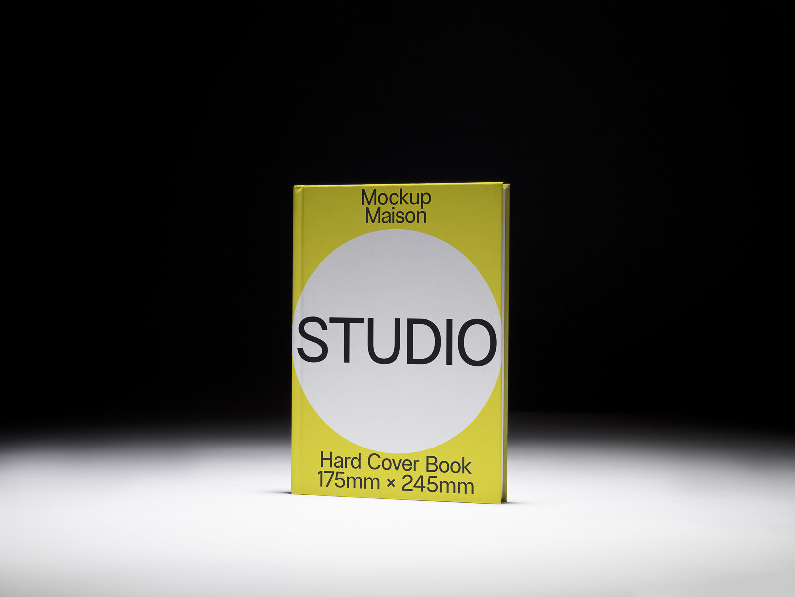 PSD mockup of a yellow hardcover book with "Studio" text in a large white circle, dimensions 175mm x 245mm displayed against a dark background.