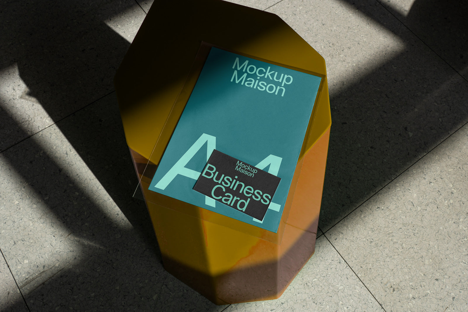 PSD mockup of an A4 document and business card on a geometric table with shadows, showcasing minimalist design.