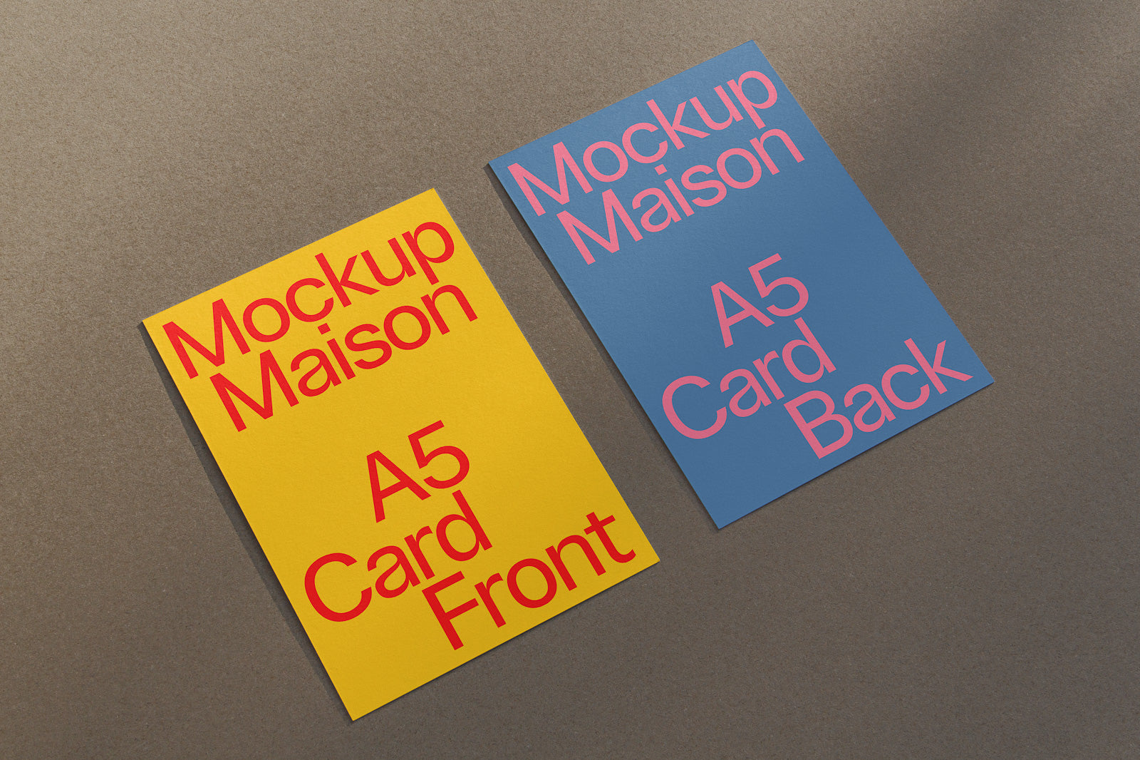 PSD mockup of two A5 cards on a textured surface, one yellow with red text reading "Mockup Maison A5 Card Front" and one blue with pink text reading "Mockup Maison A5 Card Back".