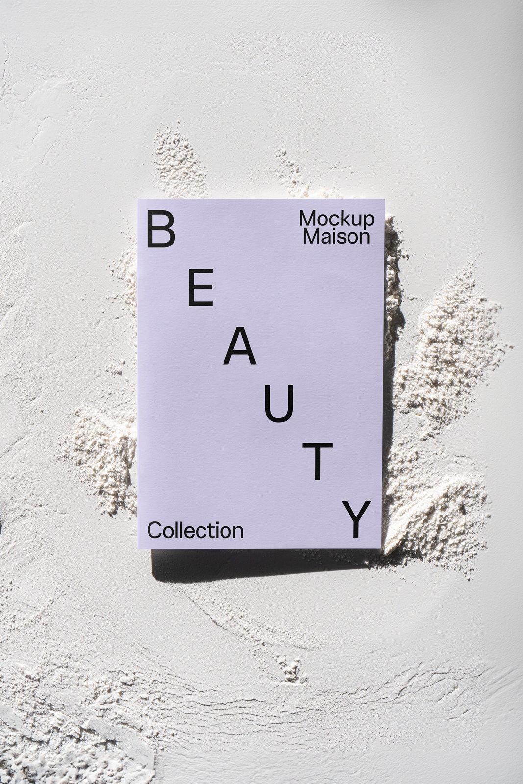 PSD mockup of a minimalistic beauty collection card on textured white surface with shadows, featuring bold black text and elegant design elements.