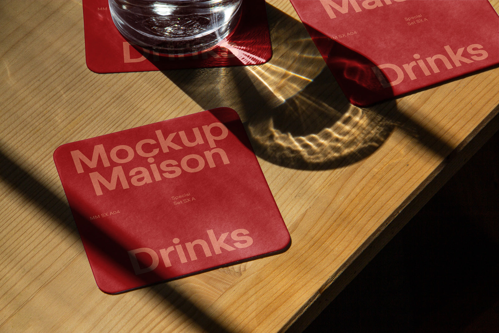 PSD mockup of red coasters on a wooden table with light reflections, featuring text "Mockup Maison" and "Drinks."