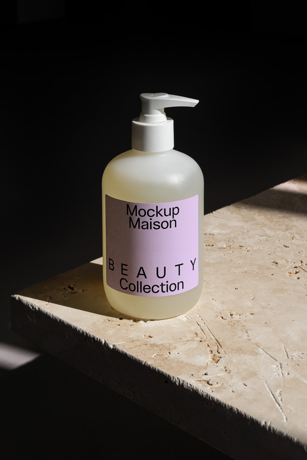 PSD mockup of a frosted pump bottle with a pastel purple label saying "Mockup Maison Beauty Collection," sitting on a textured surface.