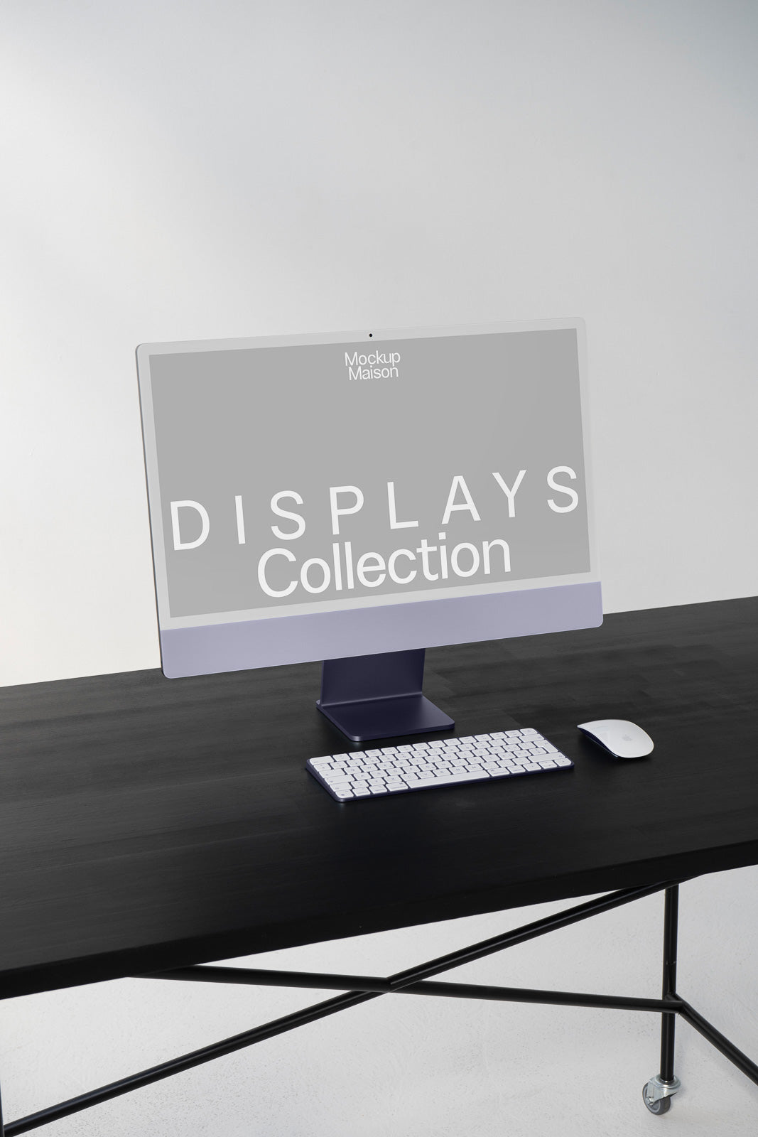 PSD mockup of a desktop computer on a black desk with a keyboard and mouse, displaying the text "DISPLAYS Collection" on the screen.
