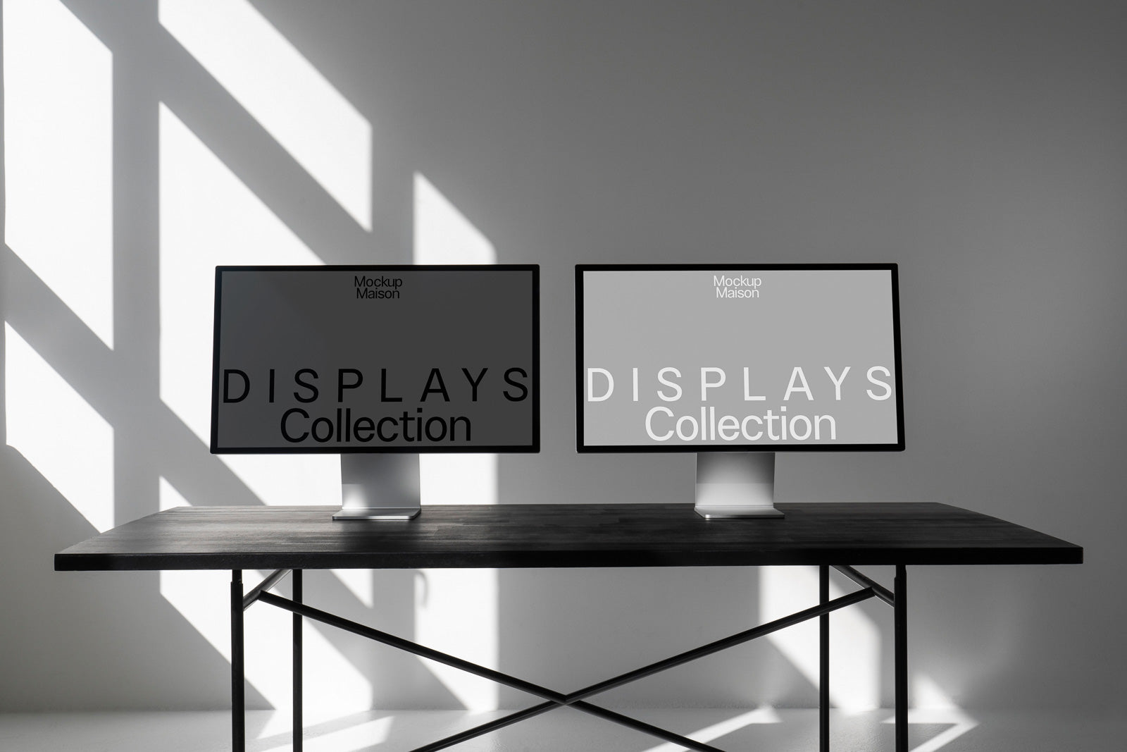 PSD mockup of two monitors with the text "Displays Collection" on a dark wood table against a light wall with shadow patterns.
