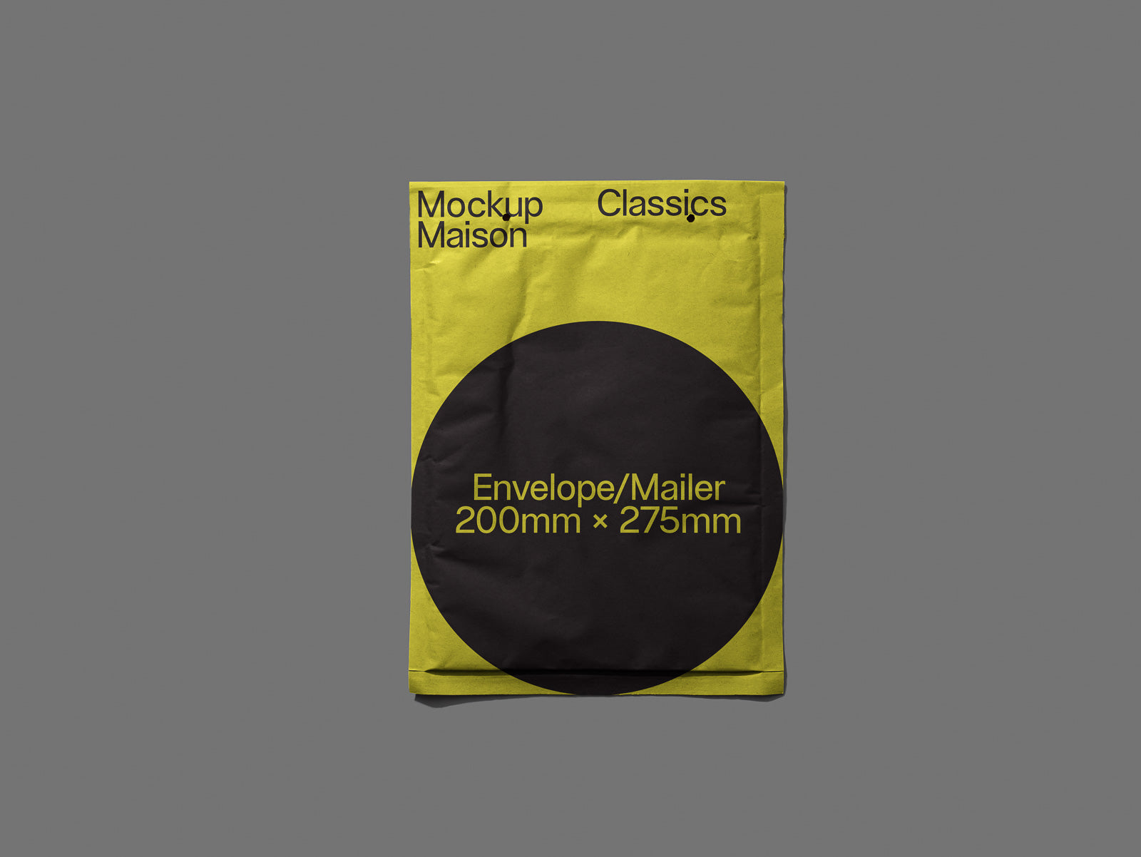 PSD mockup of a yellow and black envelope with "Mockup Maison Classics" text and dimensions "200mm x 275mm" displayed on a plain gray background.