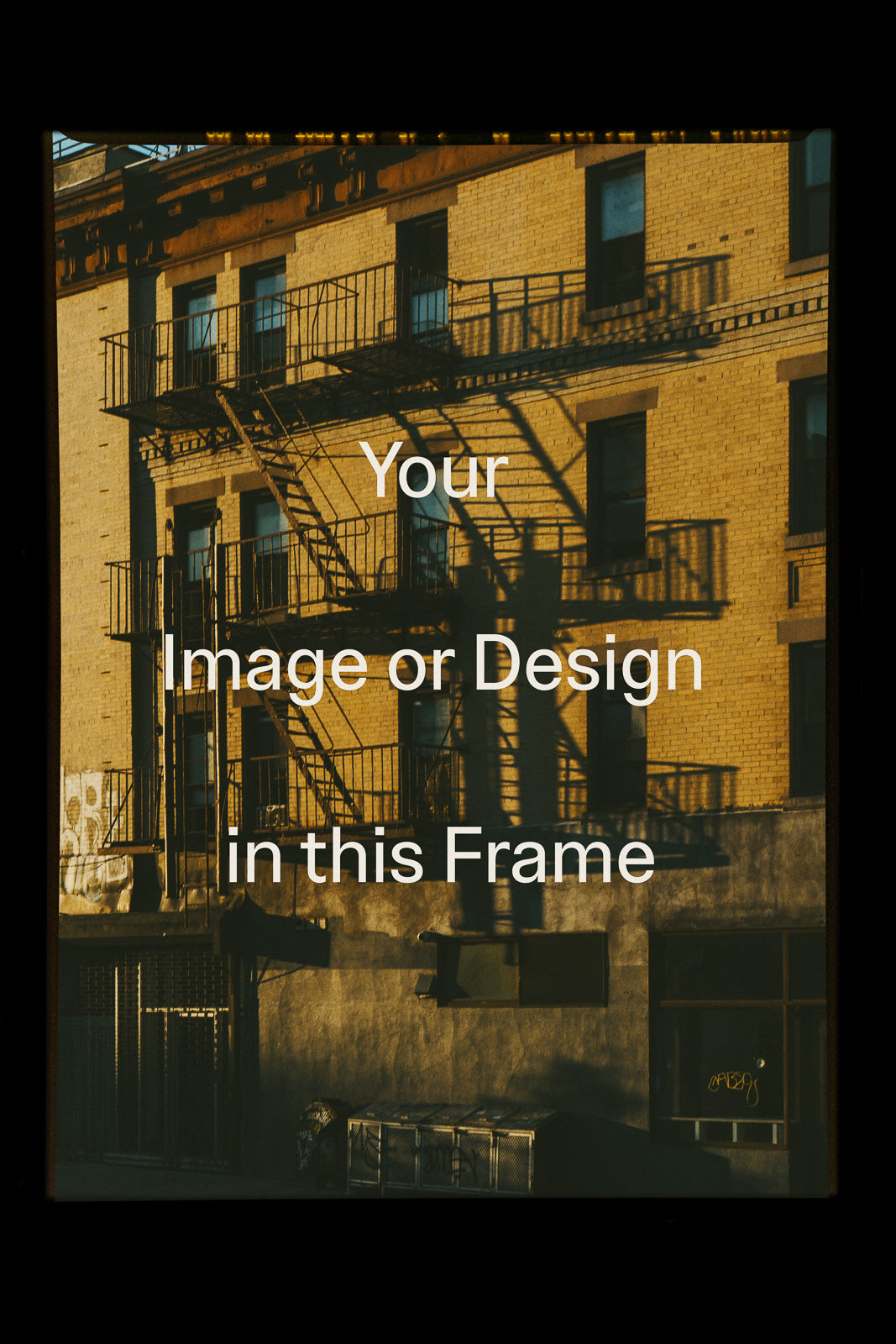 PSD mockup of a vintage brick building with fire escapes casting shadows on the facade, featuring customizable frame for image or design.