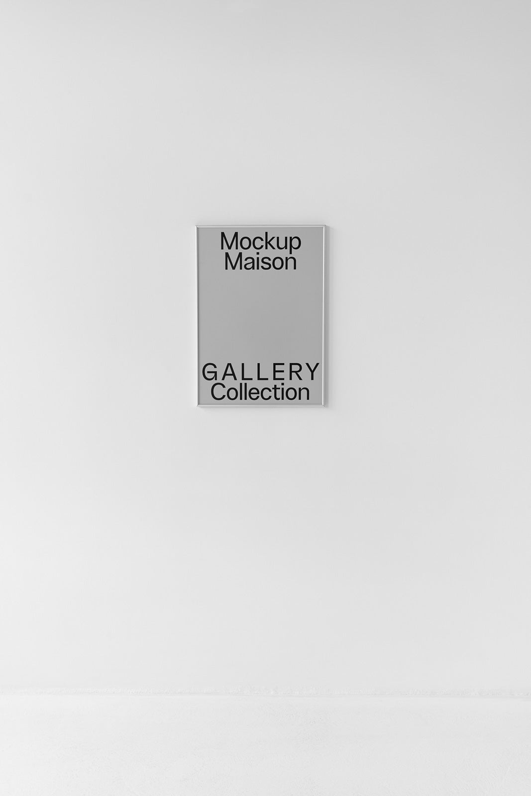 PSD mockup of a framed poster hanging on a plain white wall with the text "Mockup Maison Gallery Collection" in bold black font.
