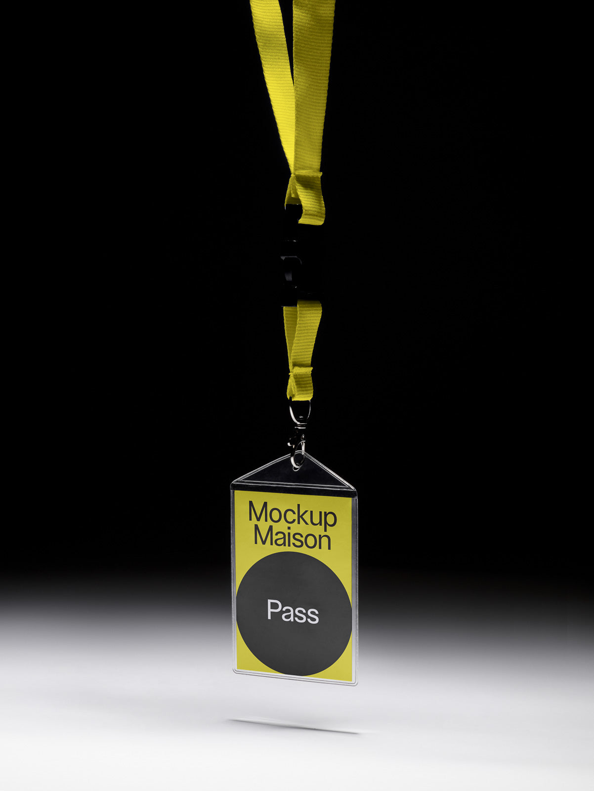 PSD mockup of a yellow lanyard holding a clear plastic badge with the text "Mockup Maison Pass" against a black background.