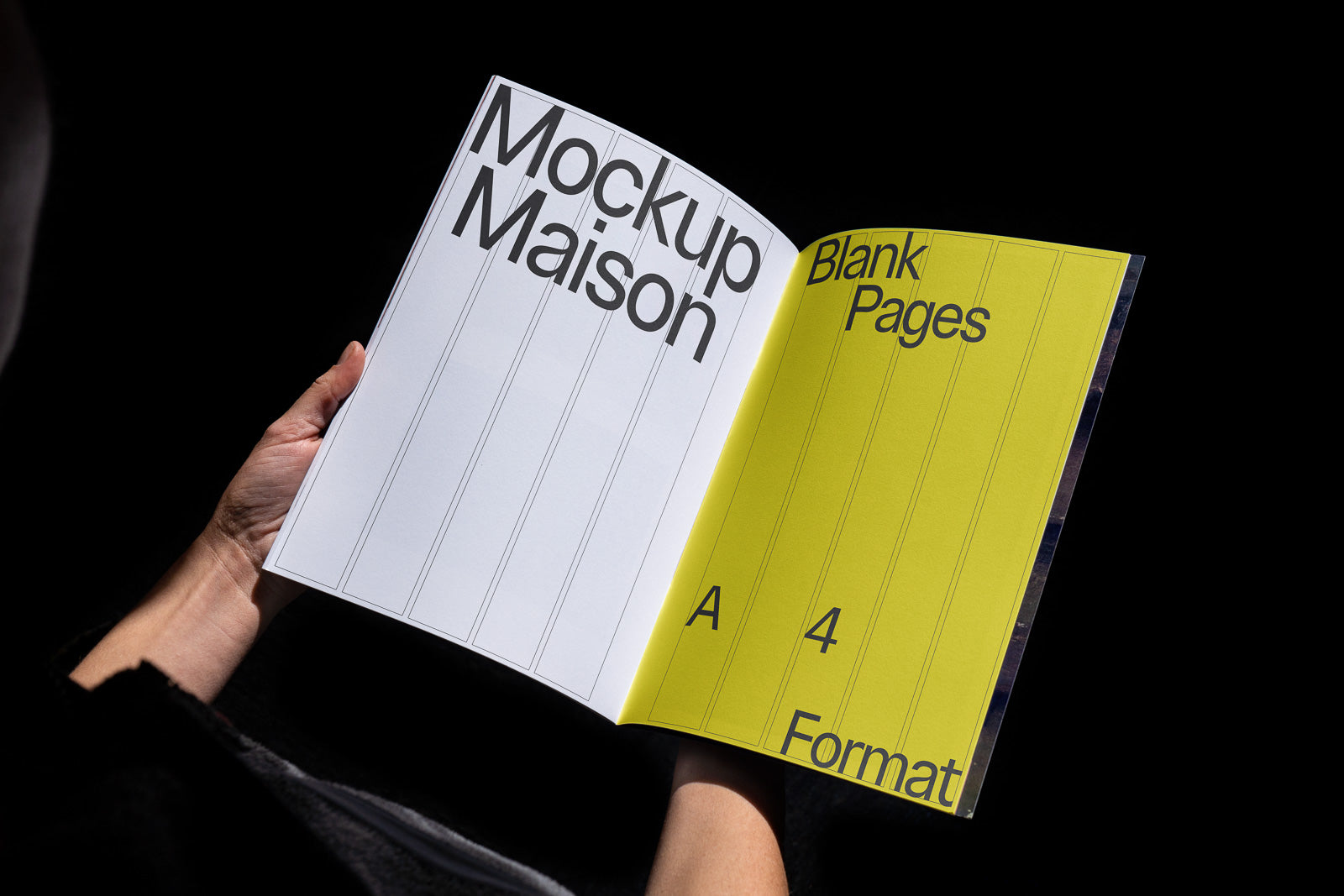 PSD mockup of a booklet held open, featuring "Mockup Maison" on the left page and "Blank Pages A4 Format" on the yellow right page against a black background.