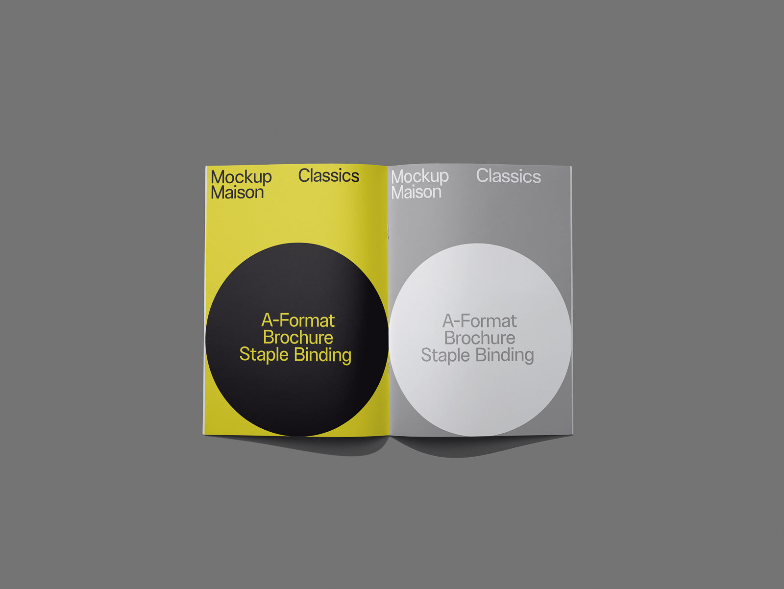 PSD mockup of an open A-Format brochure with staple binding, showcasing a yellow left page and a gray right page with bold circular graphics.