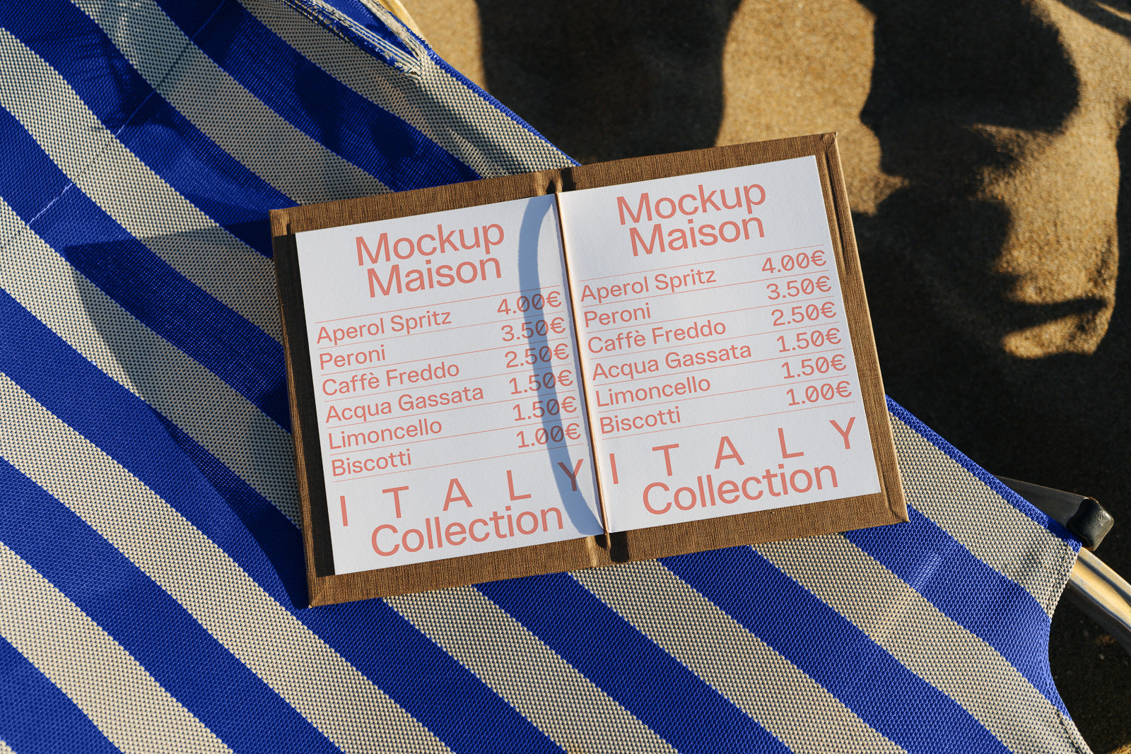 PSD mockup of a menu displaying Italian drinks and prices, placed on a blue and white striped chair with a sandy background.