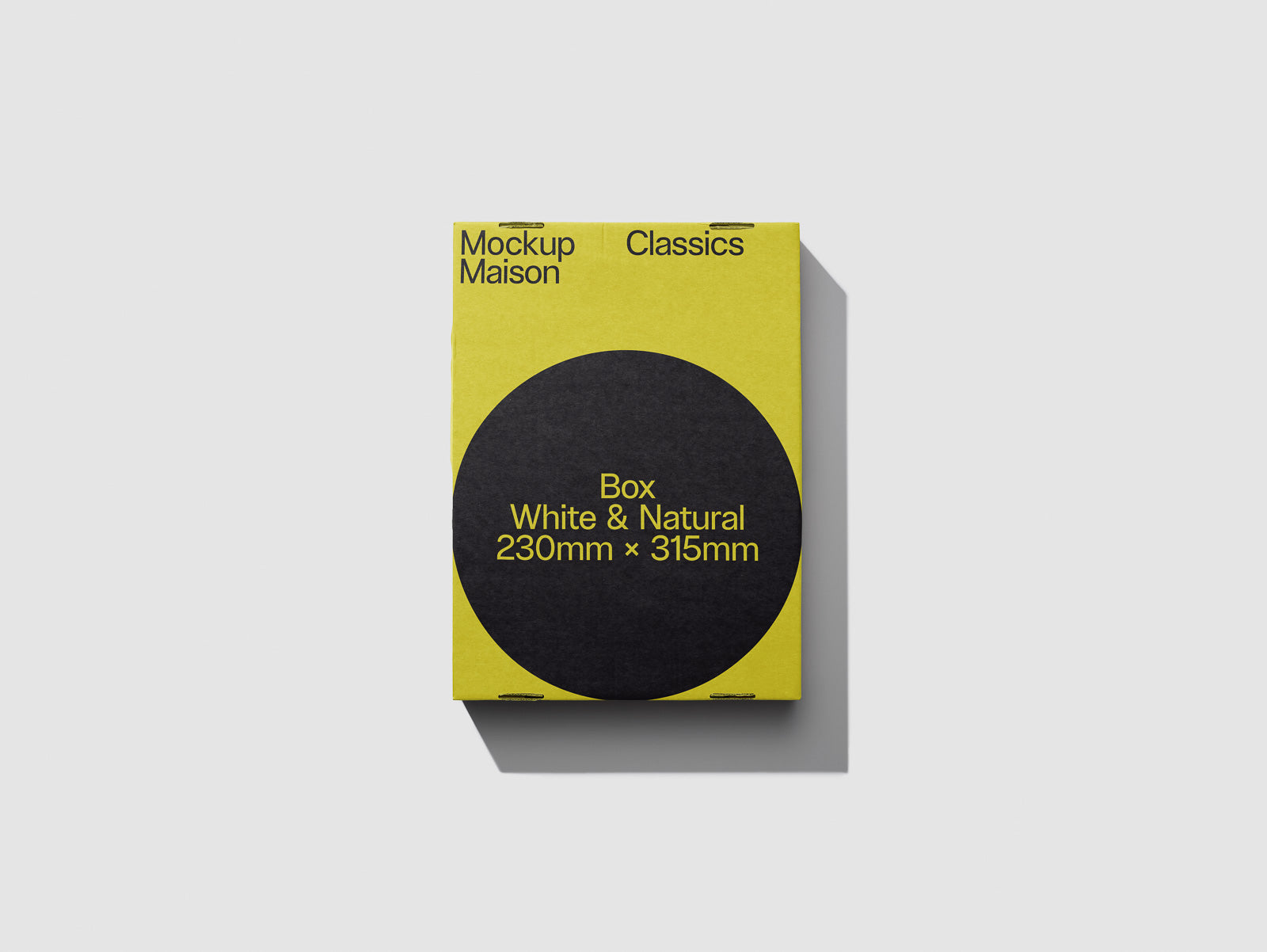 PSD mockup of a yellow and black box labeled "Mockup Maison Classics" with dimensions 230mm x 315mm, featuring a shadow on a light background.