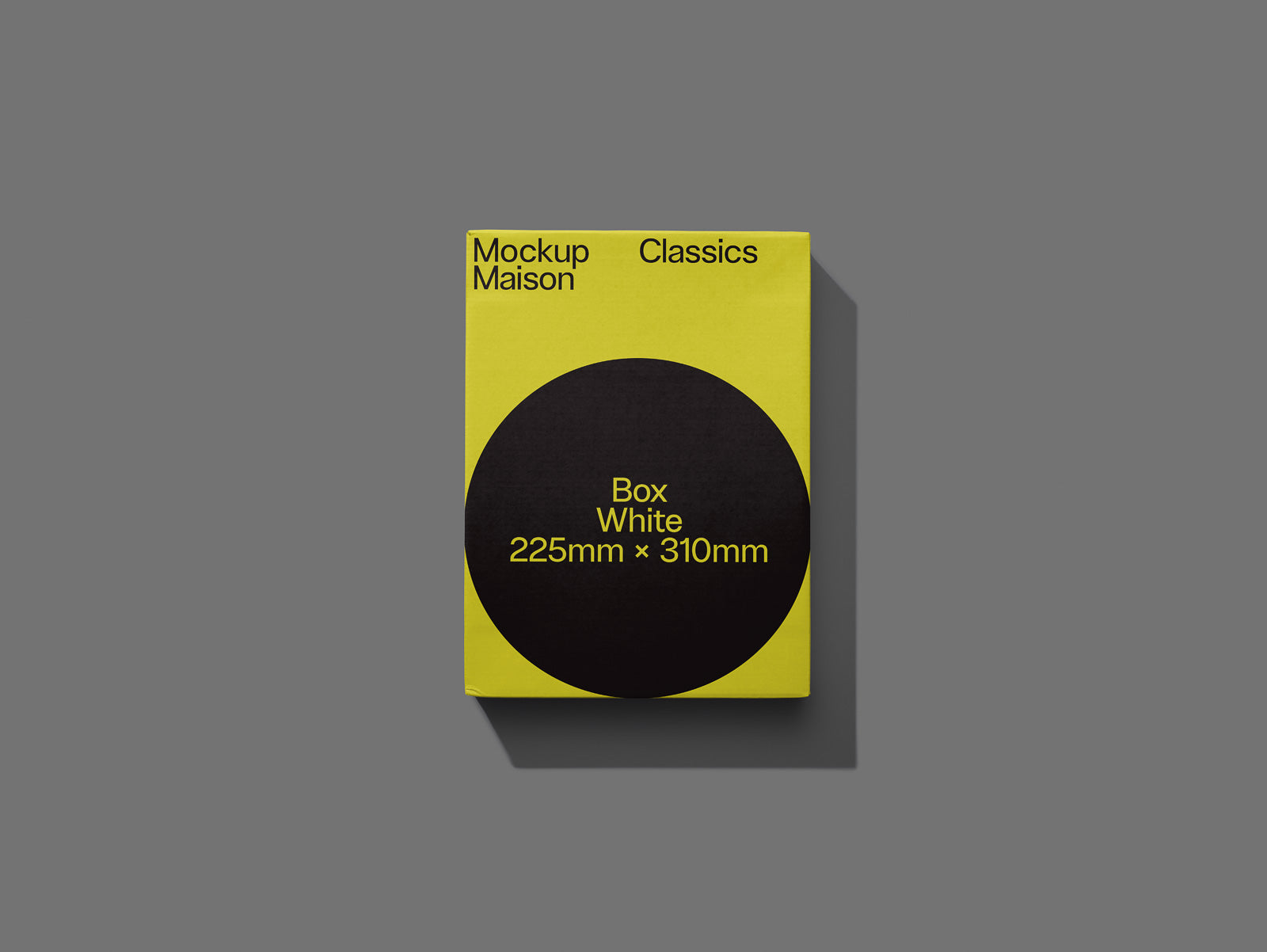 PSD mockup of a yellow and black box labeled "Box White 225mm × 310mm" with "Mockup Maison Classics" text on a gray background.
