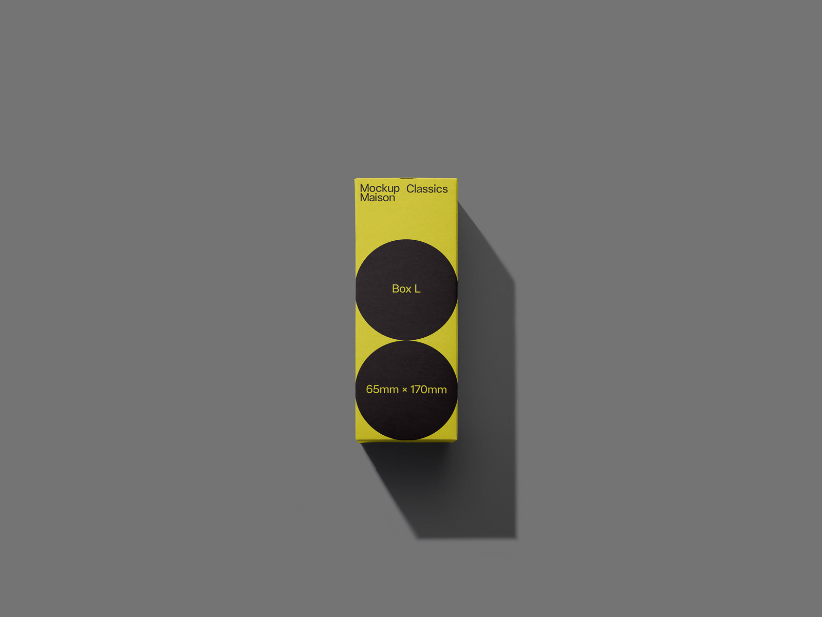 PSD mockup of a yellow rectangular box on a gray background, featuring two black circles labeled "Box L" and "65mm x 170mm."