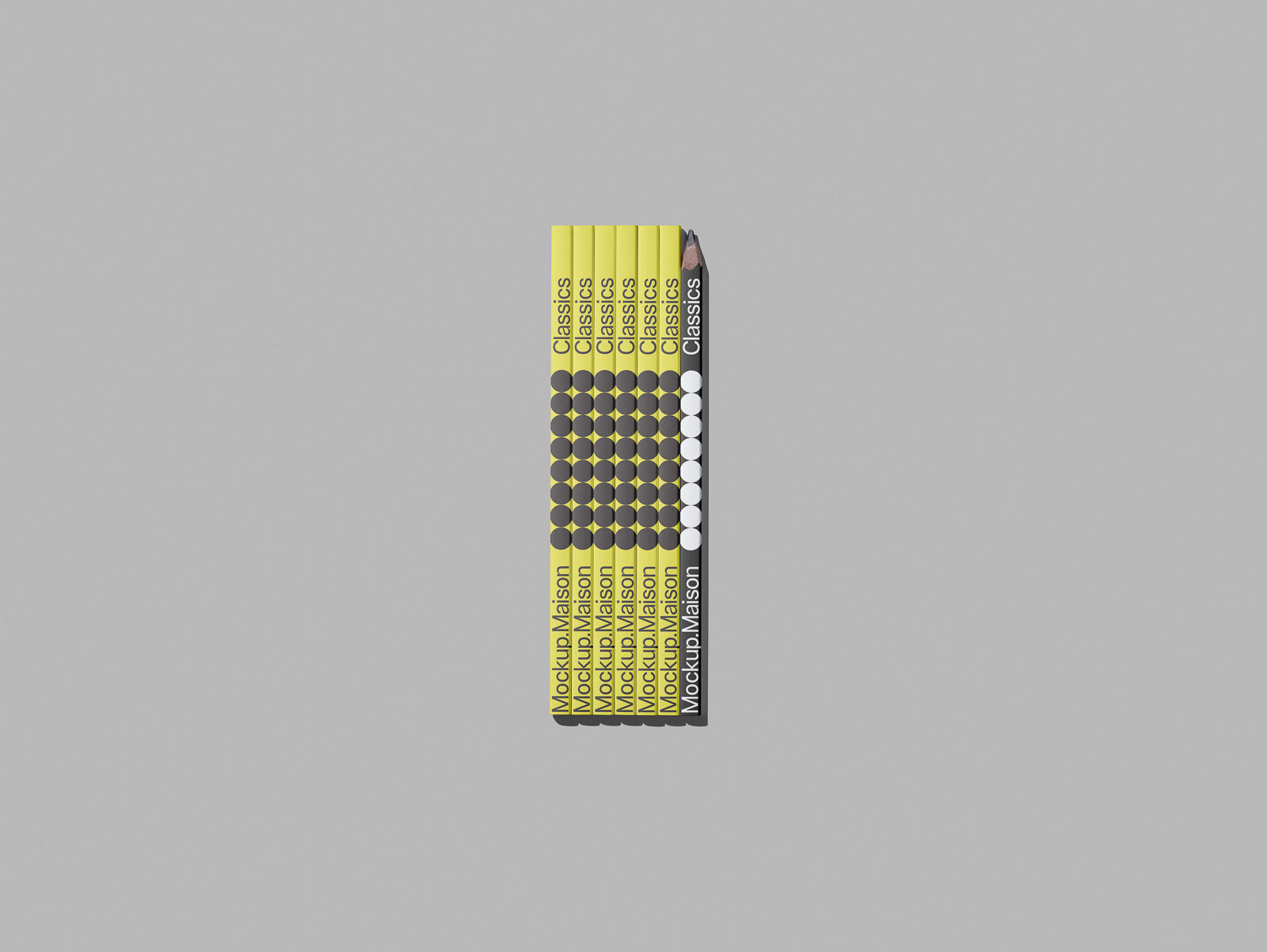 PSD mockup of a vertical stack of books with yellow and black spines, arranged neatly on a gray background.