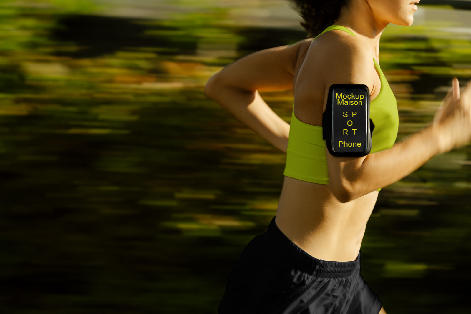 PSD mockup of a runner wearing a green sports bra and black shorts, with a phone armband displaying "Mockup Maison Sport Phone" during a jog.