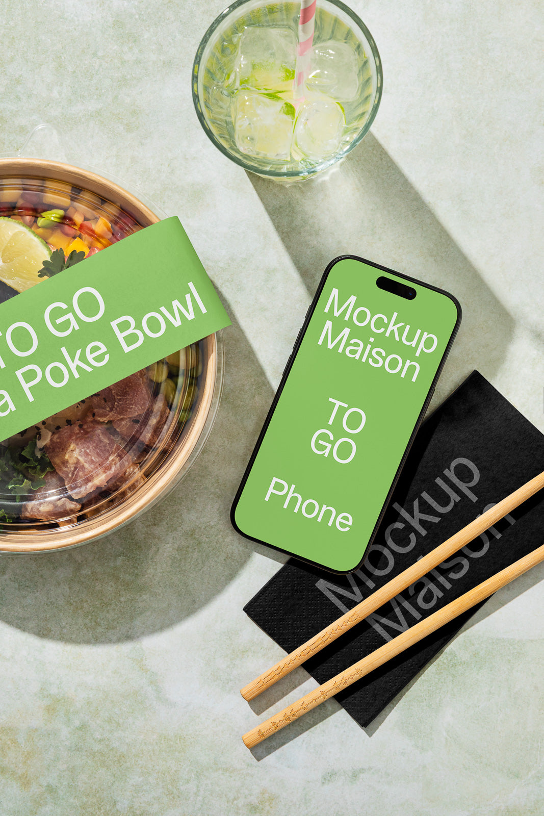 PSD mockup of a phone displaying "Mockup Maison TO GO" next to a poke bowl labeled "TO GO Poke Bowl" with chopsticks and napkin on a table.