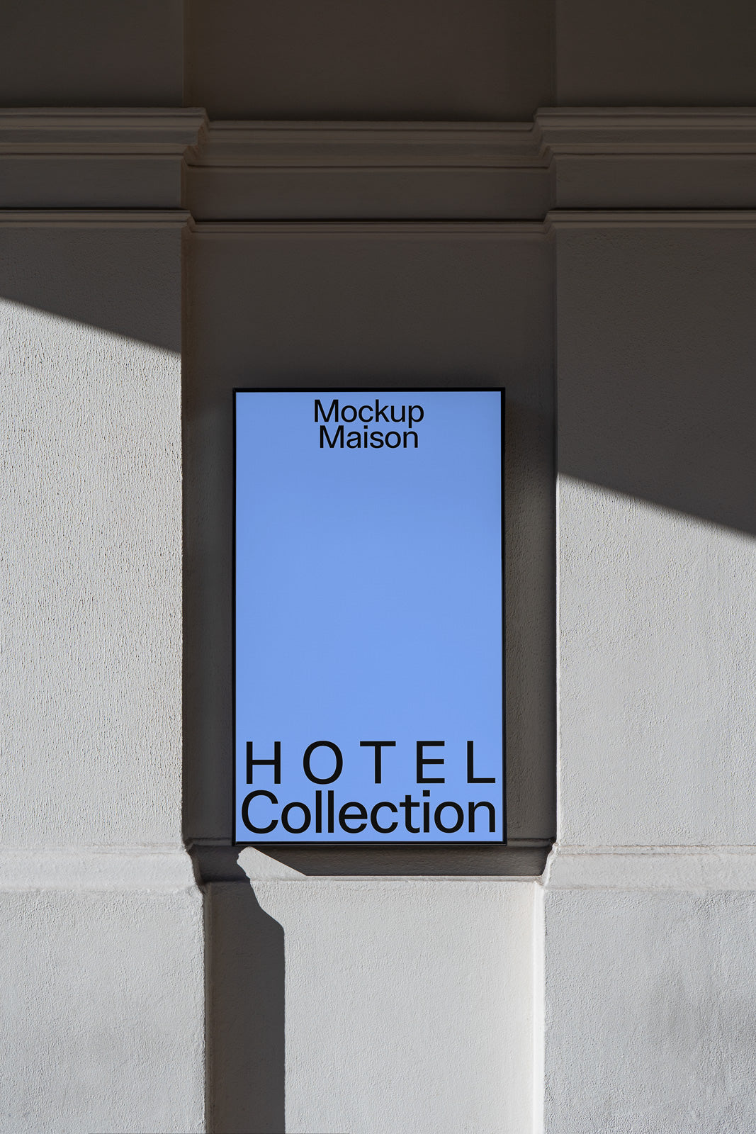 PSD mockup of a vertical blue poster with the text "Mockup Maison" and "Hotel Collection," displayed on an exterior wall with shadows.