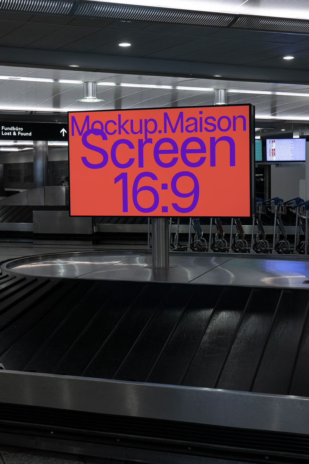 PSD mockup of a digital screen with 16:9 aspect ratio displaying vibrant text, placed in an airport's baggage claim area for visual emphasis.