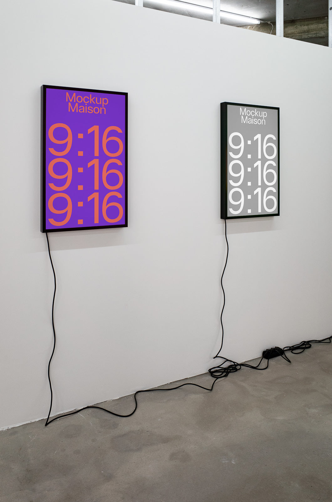 PSD mockup of two framed digital clocks on a wall, one in purple and orange, the other in gray and white, displaying the time 9:16.